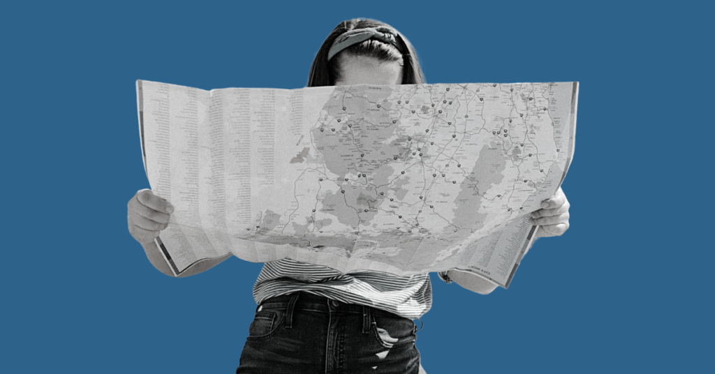 Decorative image of woman holding a map